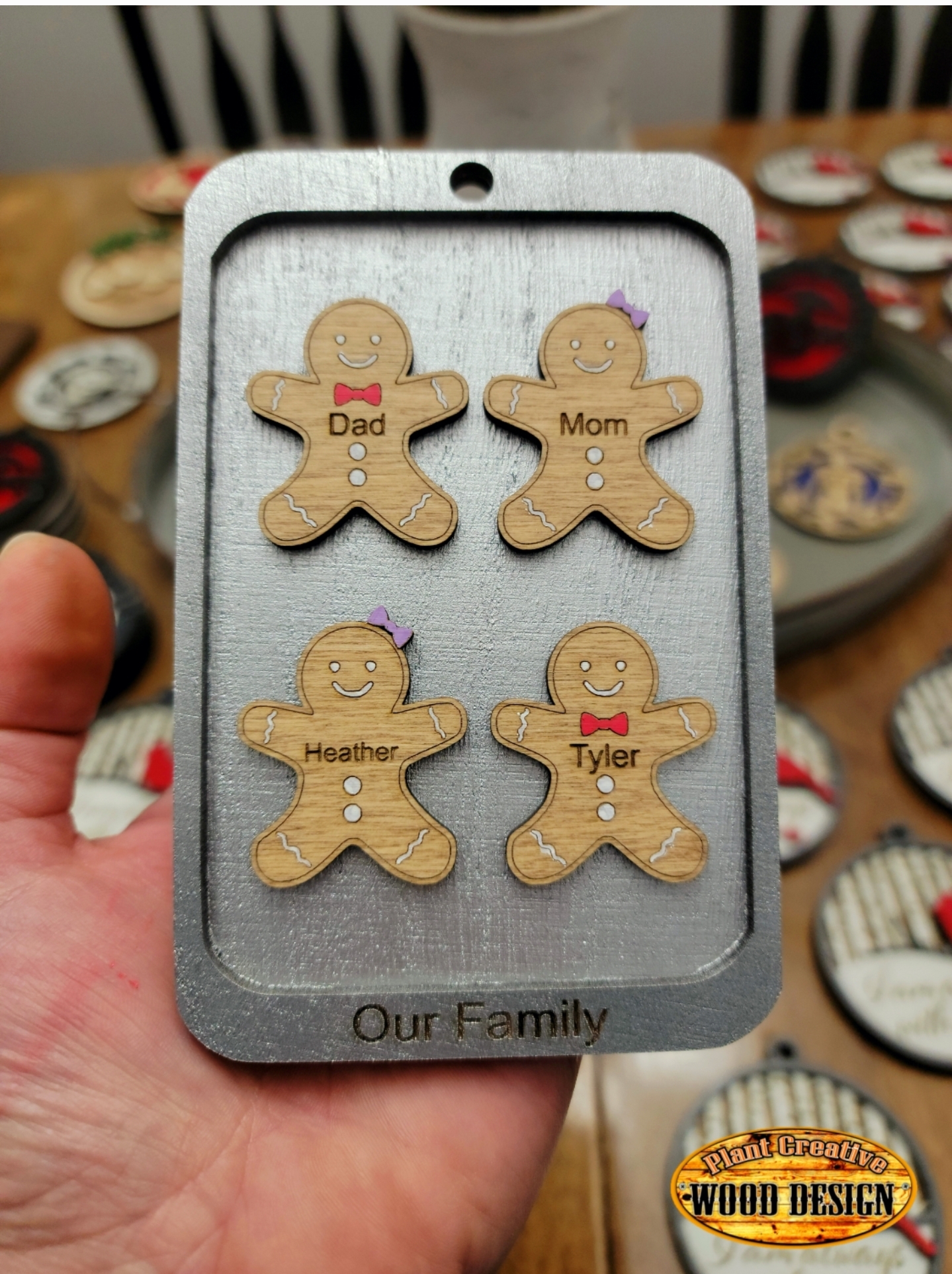 ~5.25" multi-layered gingerbread (with your choice of names on them) ornament that comes assembled and ready for display.  Carefully spell out the names you want on them correctly. This listing is priced from a total of 1-7 gingerbread men. If you require