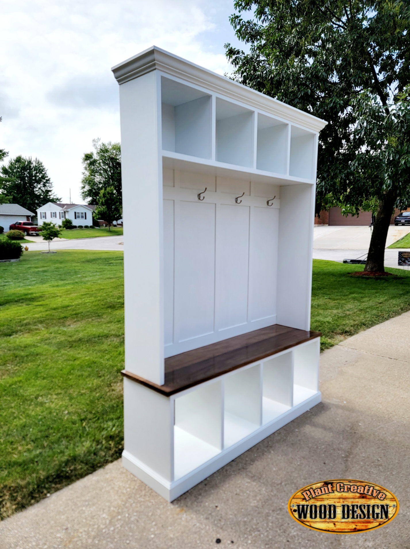 Our farmhouse hall tree made with cabinet-grade wood and solid walnut bench. Size is customizable within reason. 