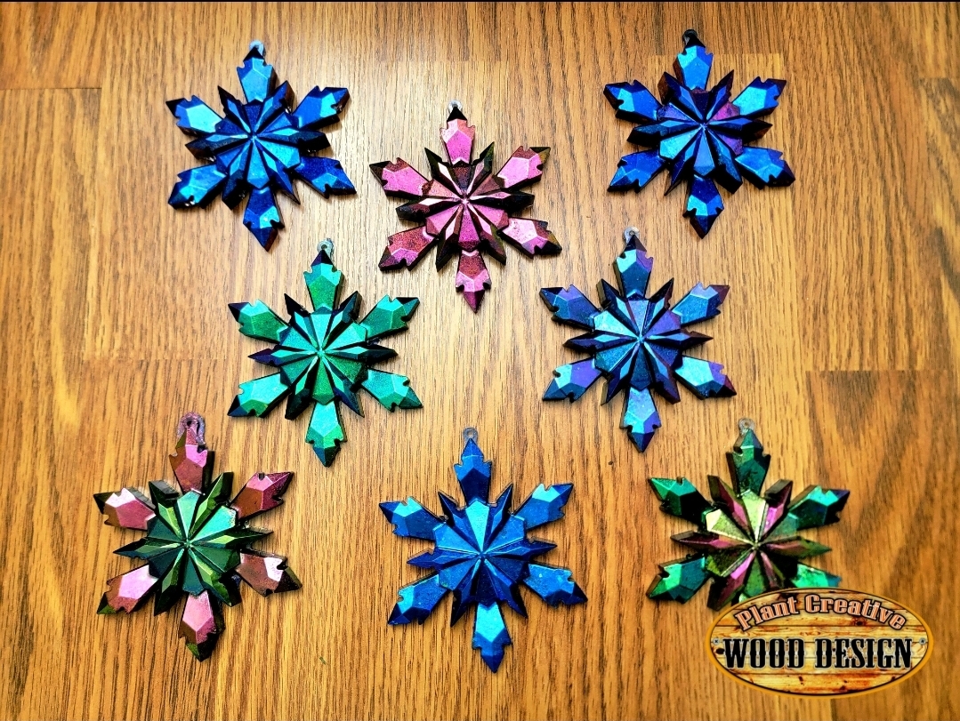 4.5" epoxy snowflakes with vivid colors and designs. 