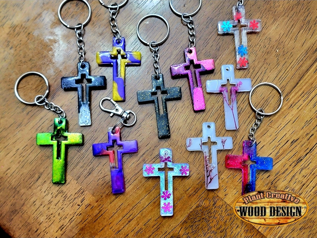 2" religious cross keychain made with epoxy resin. Each cross in unique and there is no way to replicate the same one twice. You can type into comment section of the order which ones you want or you can simply purchase a set amount here to get the Black F
