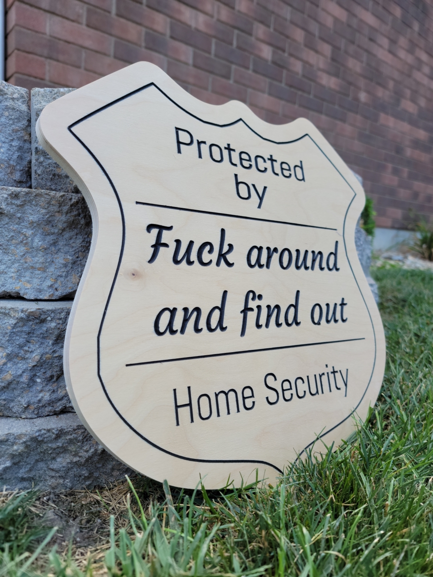 This fun sign is carved out of 1/2"-3/4" plywood and comes with several layers of clearcoat. 