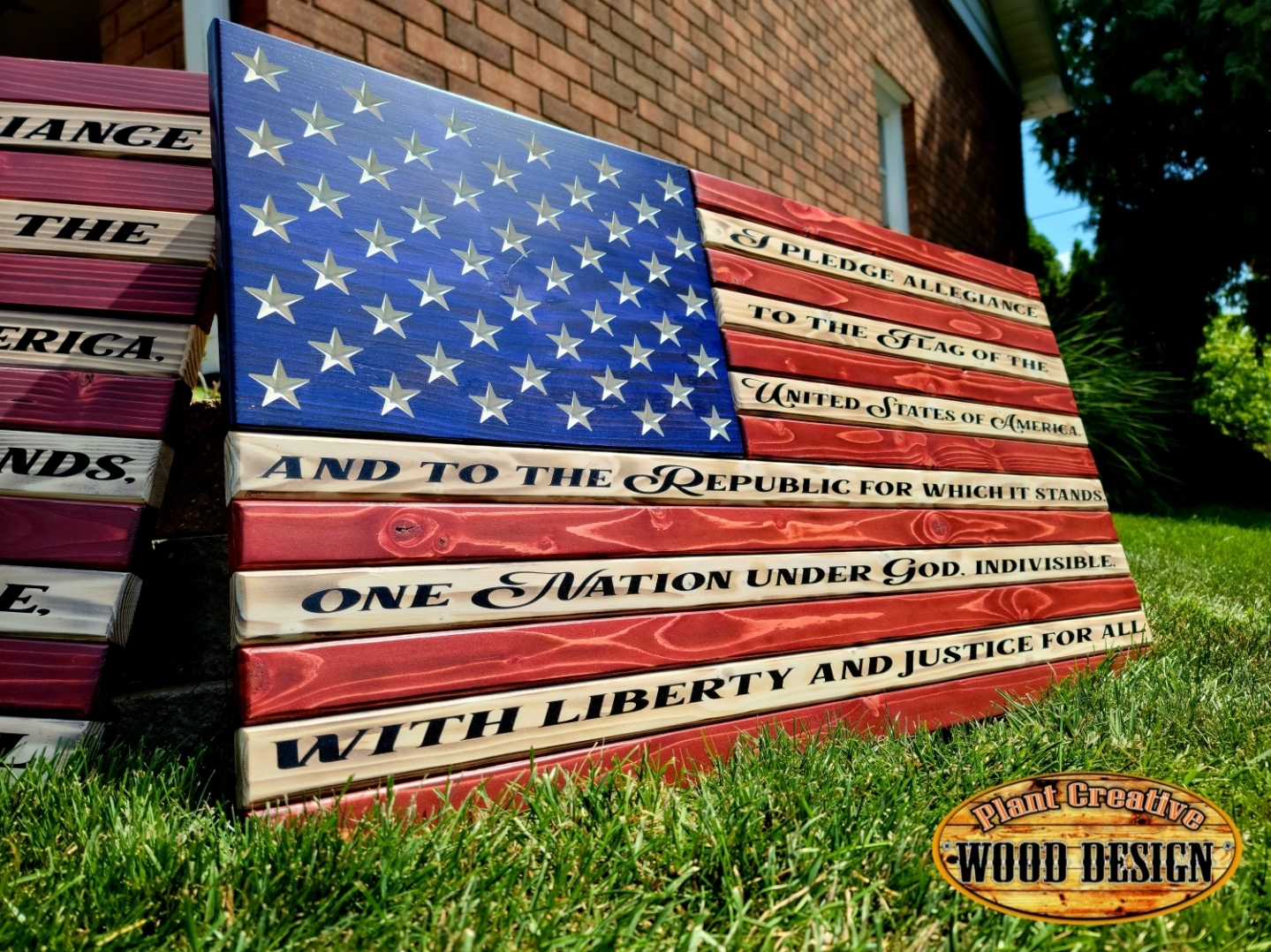 Approximately 19.5"x37", hand-made, carved stars, beautiful natural wood grain visible with words on top, and sealed to give it a uniform look. This is our highest-grade flag we create/offer! 