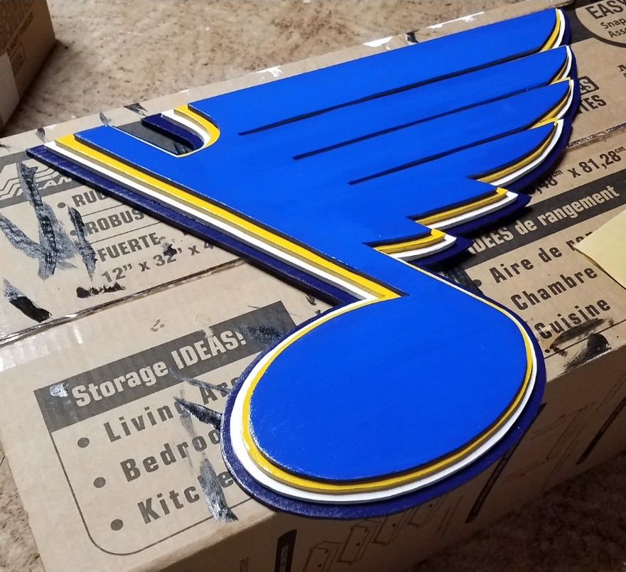 This layered 3-D sign is around 16" wide will turn heads anywhere it goes. 